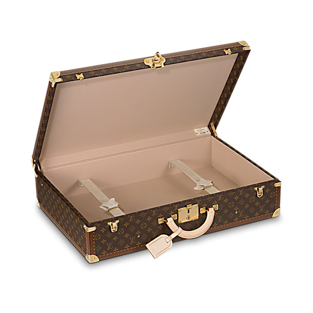 Sold at Auction: LOUIS VUITTON Bisten 65 model rigid suitcase in